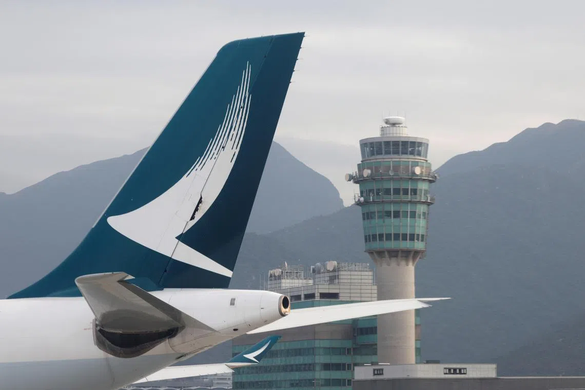 The 293 passengers and 17 crew members aboard flight CX880 were evacuated through an emergency chute at Hong Kong’s airport after the plane scrapped its takeoff and taxied back to parking.