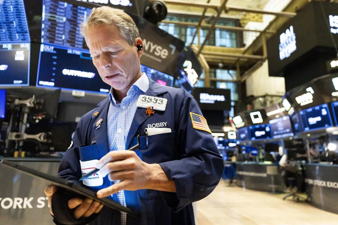 Traders working on the floor of the New York Stock Exchange, on Nov 21.