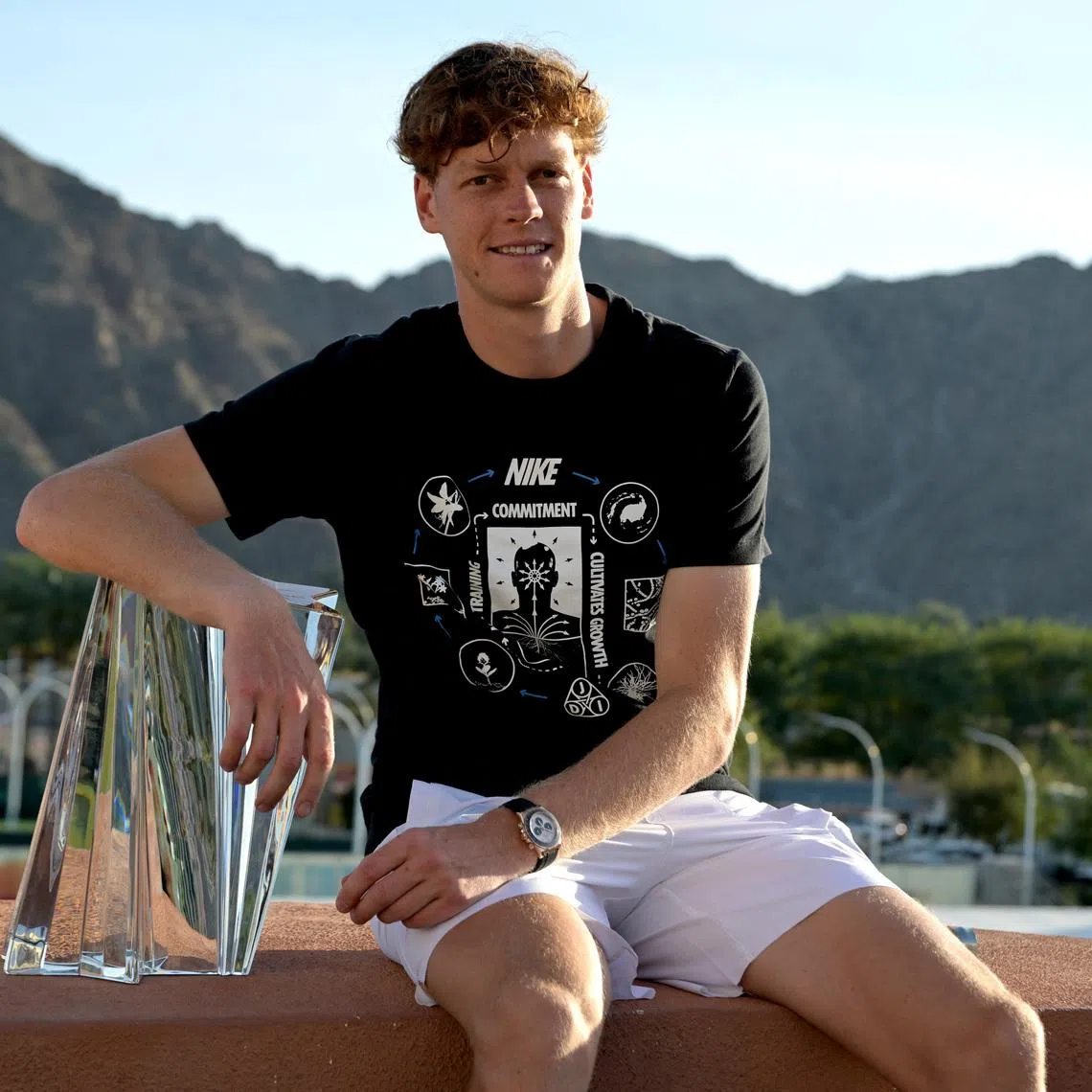 Mar 15, 2026; Indian Wells, CA, USA;  Jannik Sinner (ITA) with the championship trophy after he defeated Daniil Medvedev (RUS) in the menÕs final of the BNP Paribas Open at the Indian Wells Tennis Garden. Mandatory Credit: Jayne Kamin-Oncea-Imagn Images