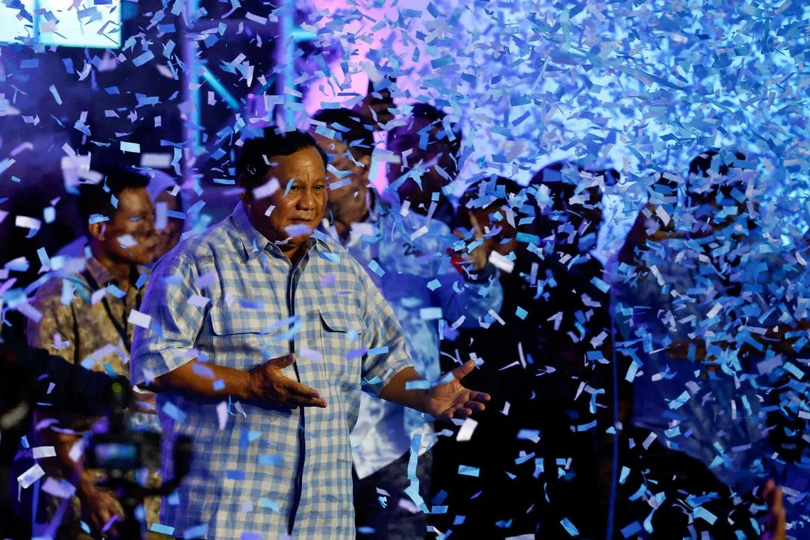 Presidential candidate Prabowo Subianto reacts while dancing as he claims victory after unofficial vote counts in Jakarta, Indonesia, February 14, 2024. REUTERS/Kim Kyung-Hoon