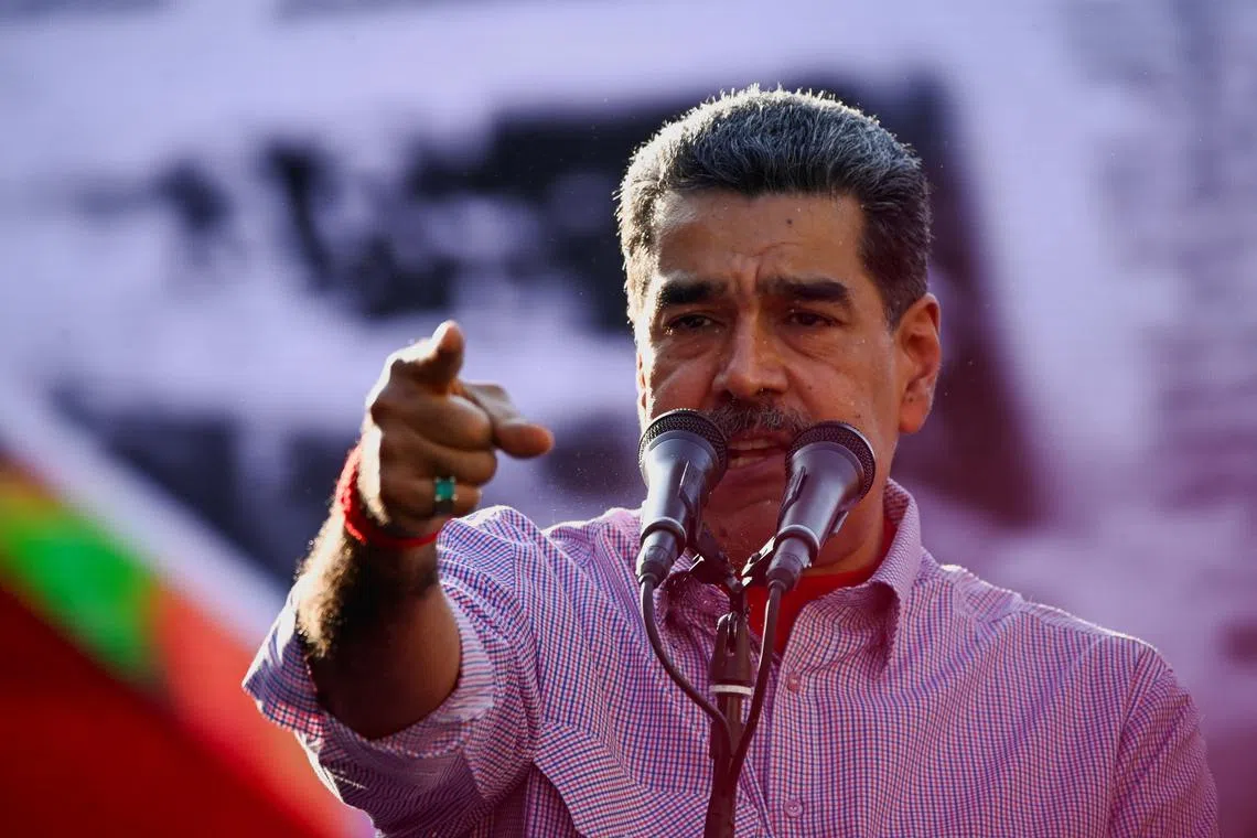 FILE PHOTO: Venezuelan President Nicolas Maduro addresses supporters during an event in Caracas, Venezuela February 27, 2025. REUTERS/Maxwell Briceno/File Photo