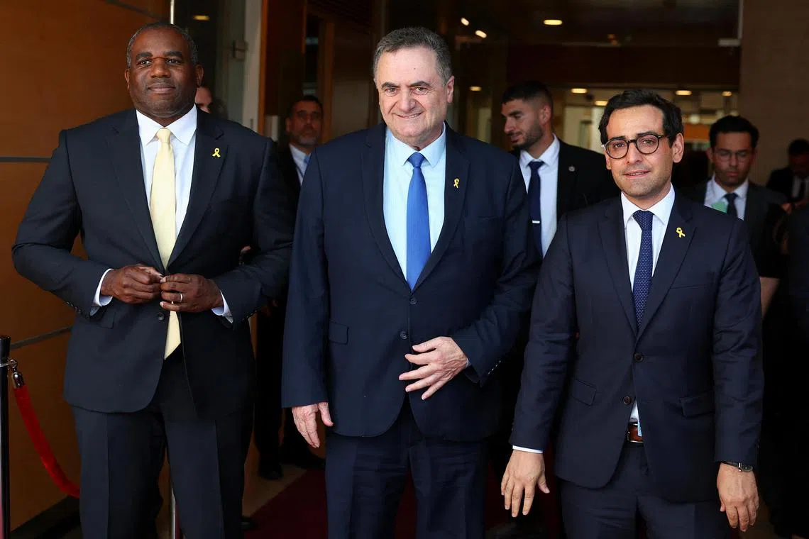 Israeli Foreign Minister Israel Katz (centre) walking in Jerusalem on Aug 16 with British Foreign Secretary David Lammy (left) and French Foreign Minister Stephane Sejourne.