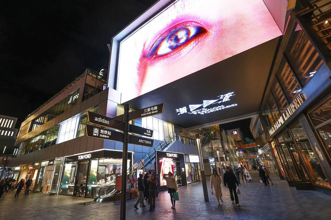 China's policymakers are hoping new stores, launches and technologies will encourage people to loosen their purse strings.