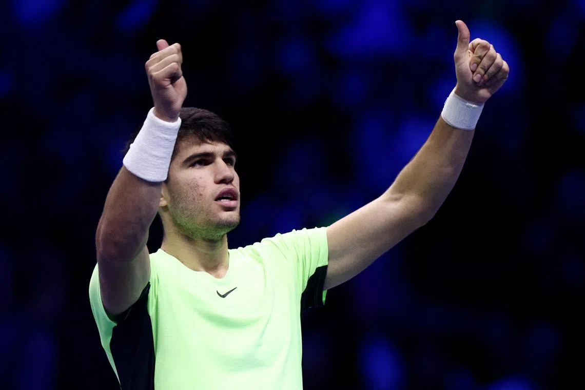Spain's Carlos Alcaraz celebrates after winning his group stage match against Russia's Andrey Rublev.