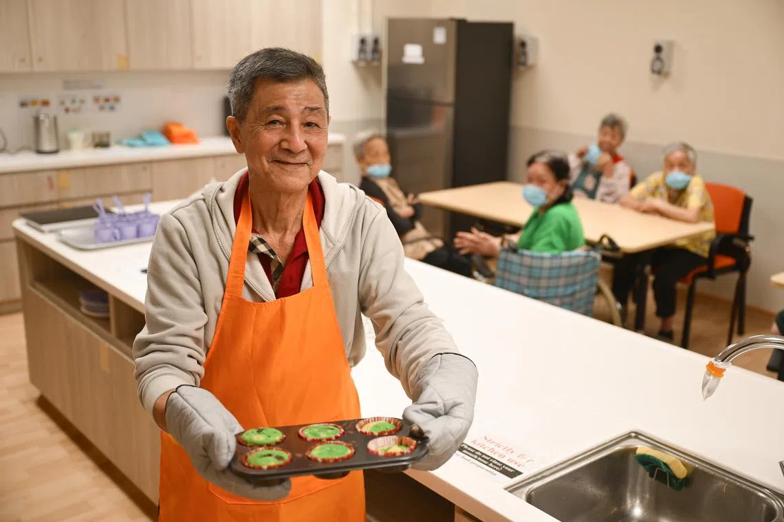 ST20240626_202464185395 clseniors Azmi Athni/Cherie Lok//

Mr Wan Kok Weng, 73, leads fellow seniors at Ren Ci @ Woodlands to bake a raisin cake during a cooking session on June 28.

ST PHOTO: AZMI ATHNI