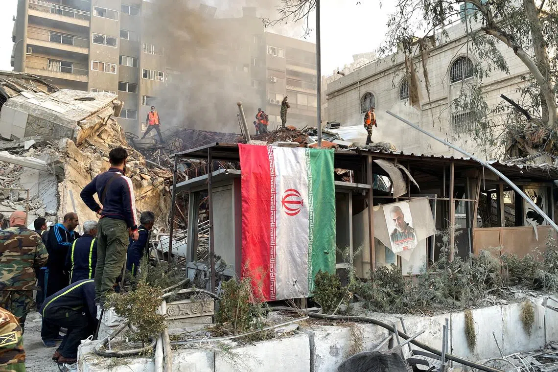 Smoke rises after what the Iranian media said was an Israeli strike on a building close to the Iranian embassy in Damascus, Syria, on April 1.