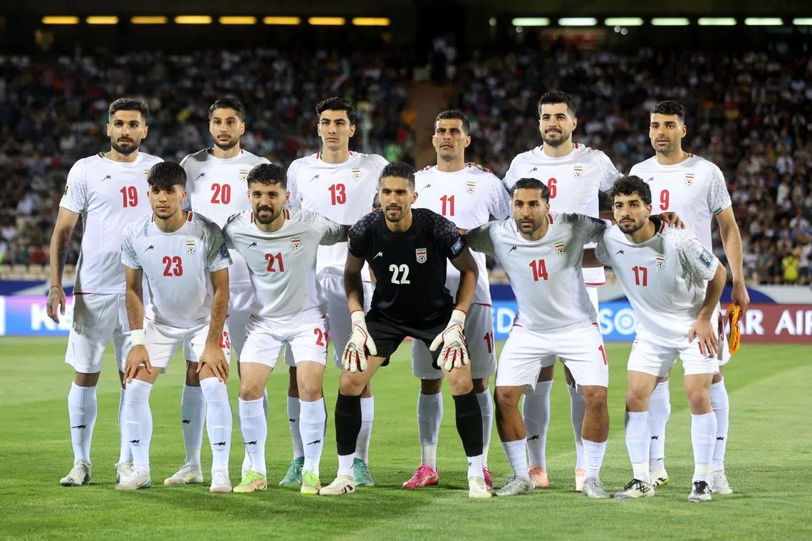 Soccer Football - World Cup - Asian Qualifiers - Group A - Iran v North Korea - Azadi Stadium, Tehran, Iran - June 10, 2025 Iran players pose for a team group photo before the match  Majid Asgaripour/WANA (West Asia News Agency) via REUTERS   A