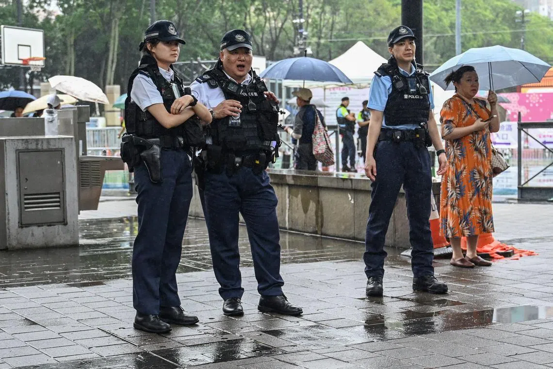 Police are seen at Victoria Park in the Causeway Bay district of Hong Kong on June 3, where people traditionally gathered annually on June 4 to mourn the victims of China's Tiananmen Square crackdown in 1989.