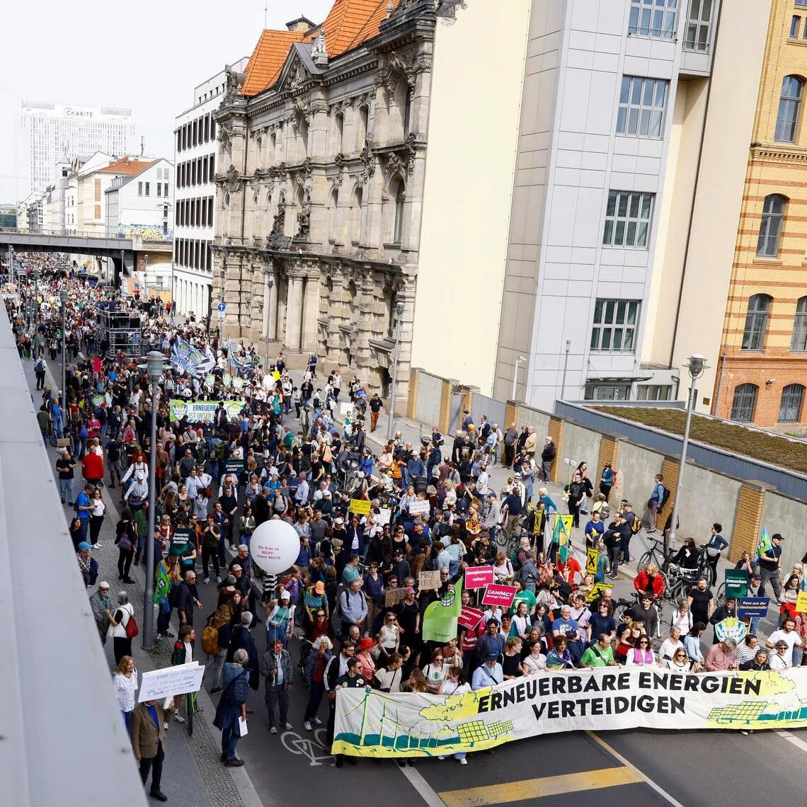 Crowds took to the streets in Germany's Berlin (above), Cologne, Hamburg and Munich on April 18, demanding a faster shift to renewable energy.