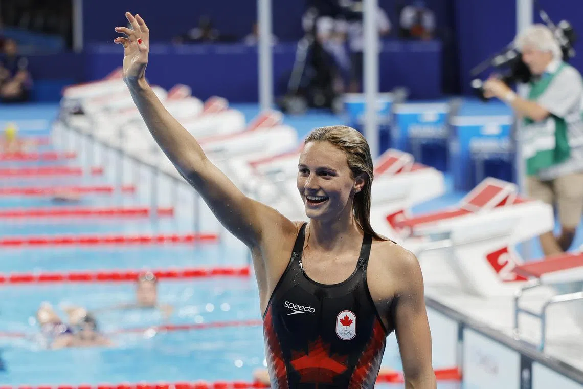 Summer McIntosh of Canada celebrating after winning the 400m individual medley final.