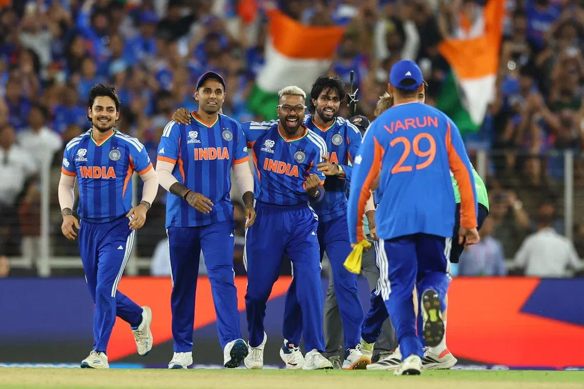 Cricket - ICC Men's T20 World Cup 2026 - Final - India v New Zealand - Narendra Modi Stadium, Ahmedabad, India - March 8, 2026 India's Hardik Pandya celebrates with teammates after winning the ICC Men's T20 World Cup. REUTERS/Anushree Fadnavis