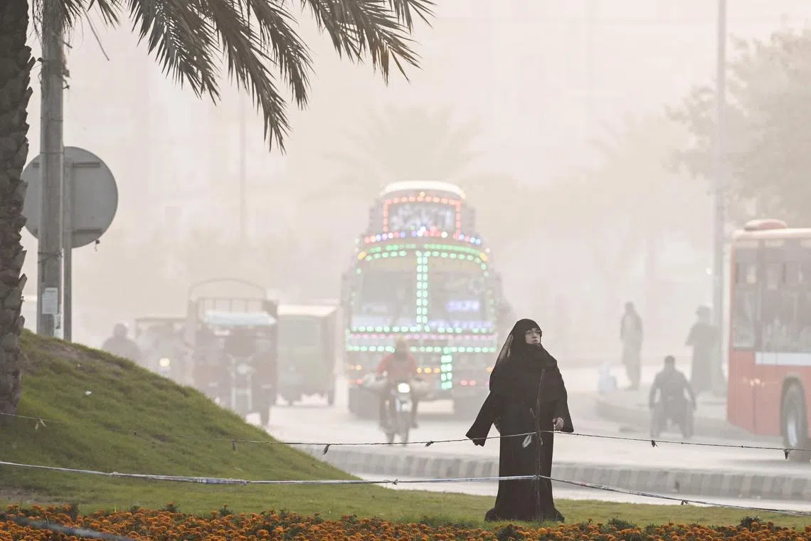 Thick smog in Lahore on Nov 20. The Pakistani metropolis regularly ranks among the world’s most polluted cities.