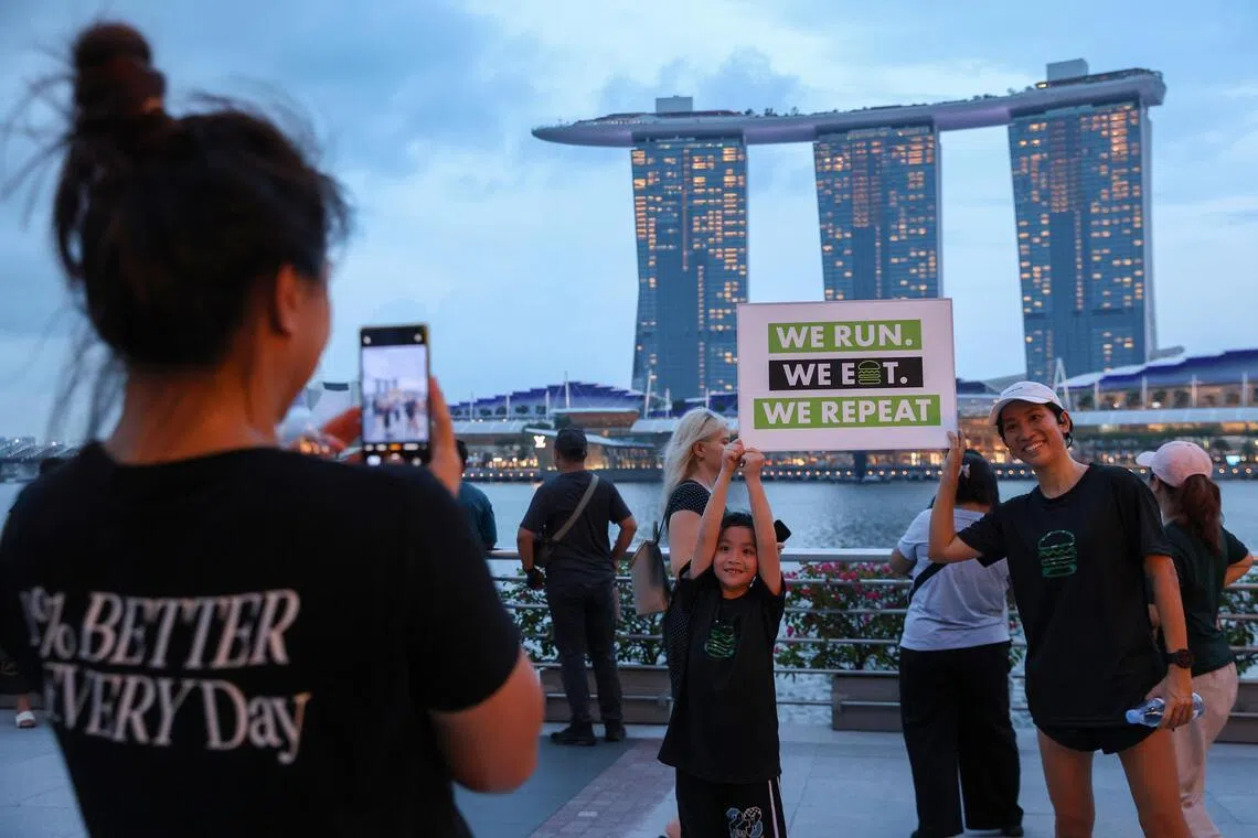 Teo Hwee Ping and her son Alden Lim signed up for the July 4 Shack Run after enjoying the previous edition in March.