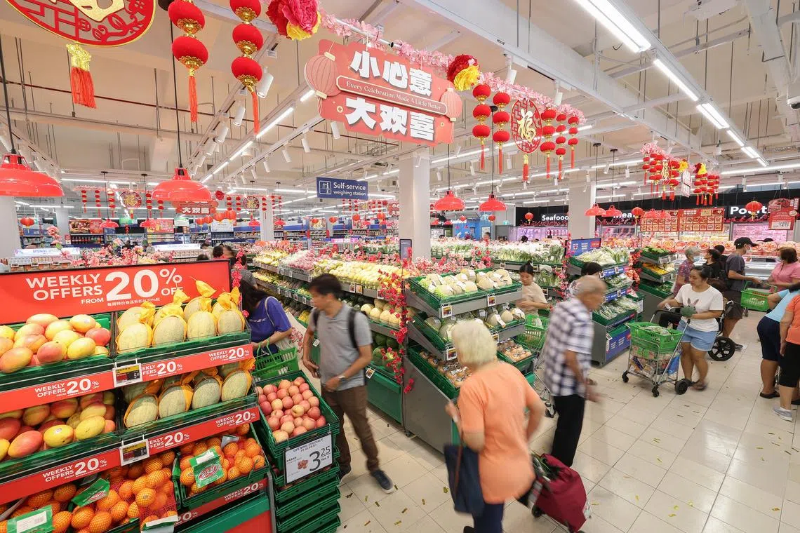The FairPrice vouchers aim to help Singaporeans stretch their dollar during the festive season.