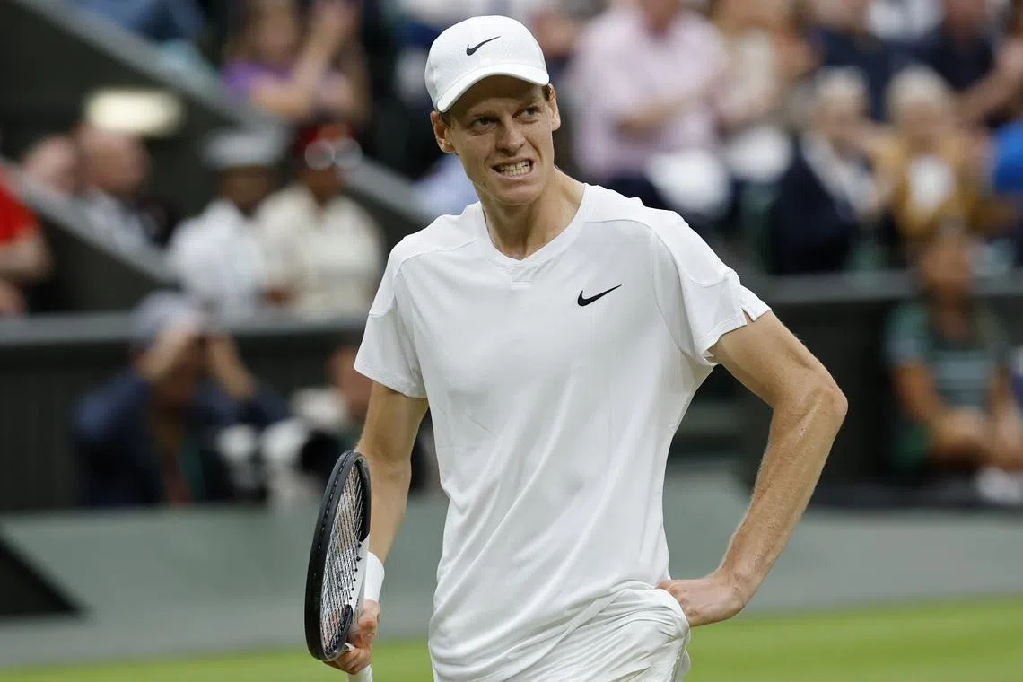 FILE PHOTO: Jul 9, 2024; London, United Kingdom; Jannik Sinner (ITA) reacts after winning a point against Daniil Medvedev (not pictured) in a gentlemen's singles quarter-final match on day nine of The Championships Wimbledon 2024 at The All England Lawn Tennis Club. Mandatory Credit: Geoff Burke-USA TODAY Sports/File Photo