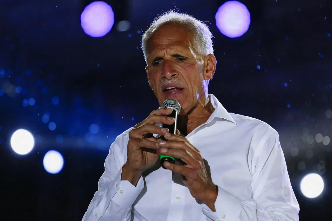 Honduran presidential candidate Nasry Asfura, of the National Party (PN), addresses supporters during his closing campaign rally ahead of the November 30 general election, in Tegucigalpa, Honduras, November 22, 2025. REUTERS/Leonel Estrada