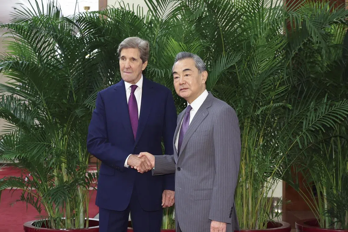 China's Wang Yi meets with US Special Presidential Envoy for Climate John Kerry in Beijing.