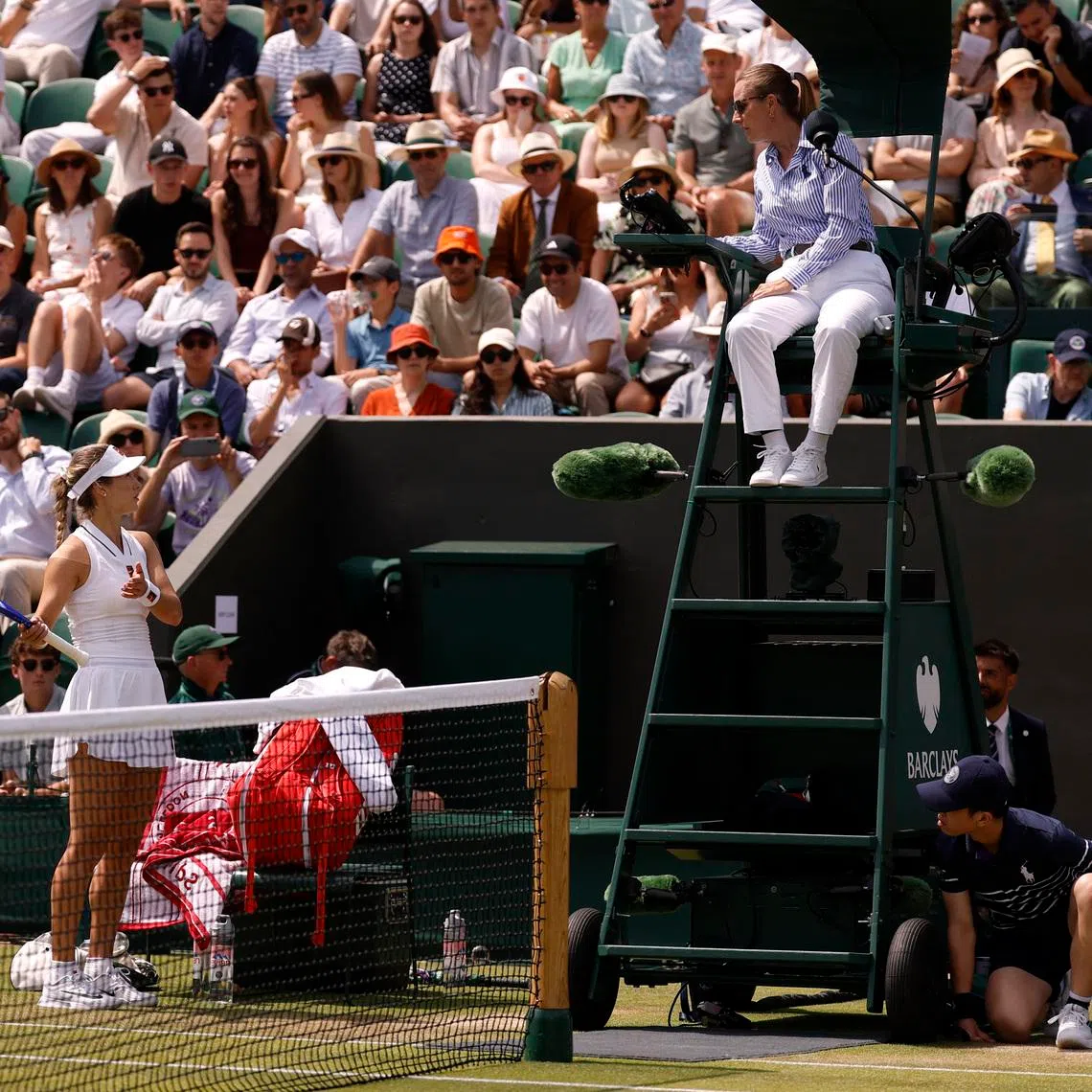 Tennis - Wimbledon - All England Lawn Tennis and Croquet Club, London, Britain - July 3, 2026 Russia's Anna Kalinskaya talks to the chair umpire about noise in the crowd during her third round match against Switzerland's Belinda Bencic REUTERS/Andrew Couldridge