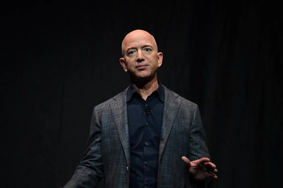 FILE PHOTO: Amazon founder Jeff Bezos speaks during an event about Blue Origin's space exploration plans in Washington, U.S., May 9, 2019. REUTERS/Clodagh Kilcoyne/File Photo