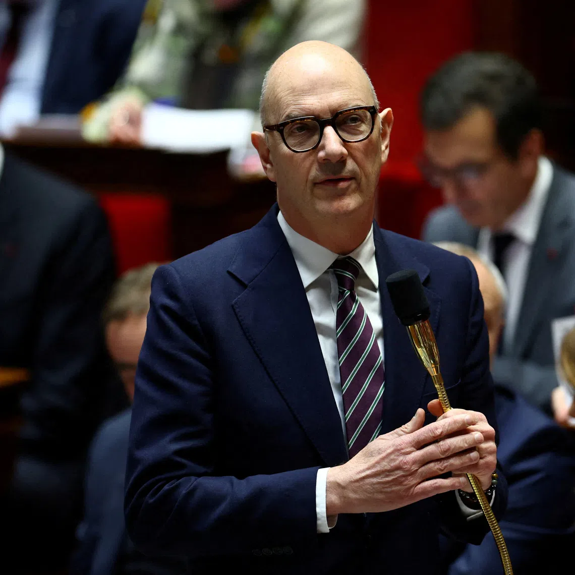 FILE PHOTO: French Economy Minister Roland Lescure speaks during the questions to the government session at the National Assembly in Paris, France, December 9, 2025. REUTERS/Sarah Meyssonnier/File Photo
