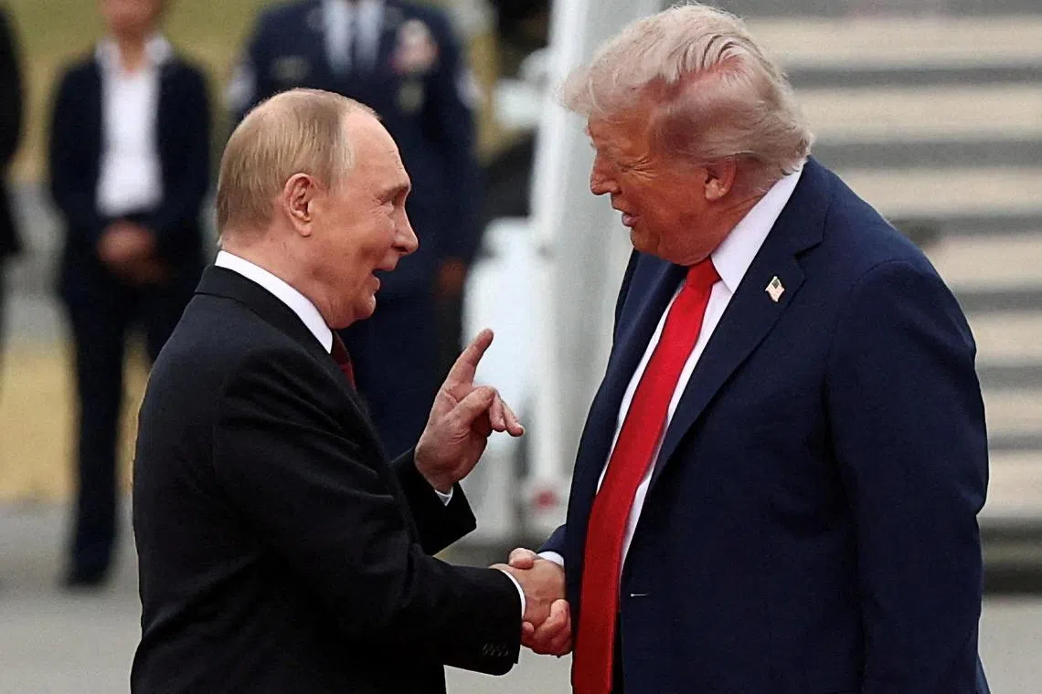 US President Donald Trump shakes hand with Russian President Vladimir Putin at Joint Base Elmendorf-Richardson in Anchorage, Alaska, on Aug 15, 2025.