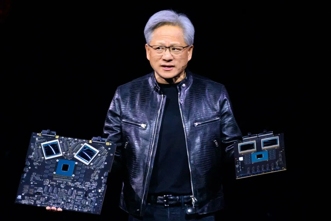 Nvidia chief executive Jensen Huang presenting products at the firm's annual GTC Artificial Intelligence Conference in San Jose, California, on March 18.