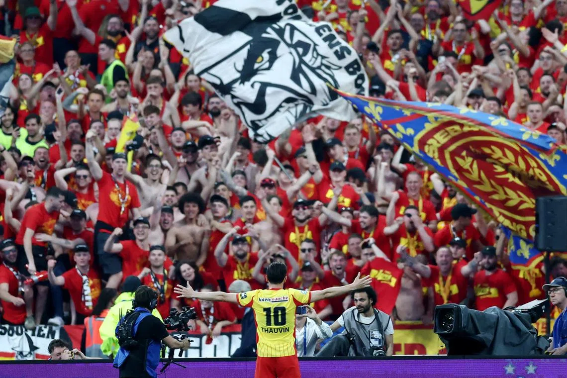 Soccer Football - Coupe de France - Final - RC Lens v OGC Nice - Stade de France, Saint Denis, France - May 22, 2026 RC Lens' Florian Thauvin celebrates scoring their first goal REUTERS/Stephane Mahe