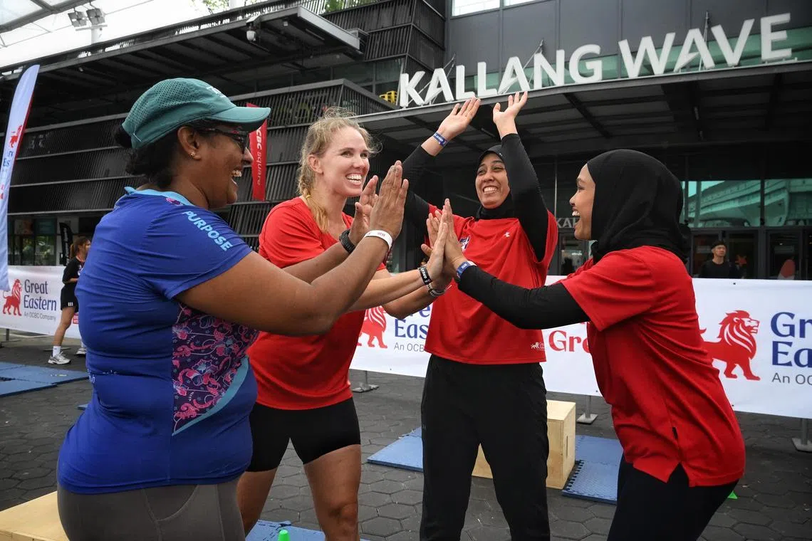 (From left) Preeti Mohan, Michelle Seyffert, Nur Suhaifah Salikin and Siti Khadijah Khalib after completing The Great 117, an all-women fitness experience leading up to the Great Eastern Women's Run 2025.