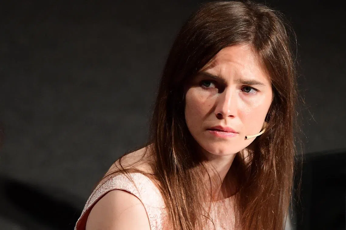 (FILES) US Amanda Knox attends a panel discussion titled "Trial by Media" during the Criminal Justice Festival in Modena, northern Italy on June 15, 2019. Amanda Knox said on June 03, 2024 she would be back in court in Italy this week for a slander case linked to her conviction and later acquittal for the murder of her British roommate. Knox, from Seattle, was 20 when she was arrested alongside her then Italian boyfriend and a Congolese bar owner over the brutal killing of 21-year-old exchange student Meredith Kercher in their shared apartment in Perugia. (Photo by Vincenzo PINTO / AFP)