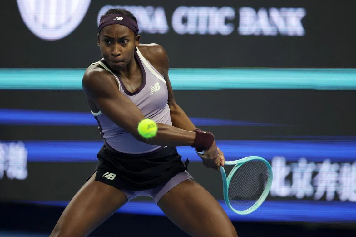 Coco Gauff hitting the ball against Karolina Muchova in the China Open final.