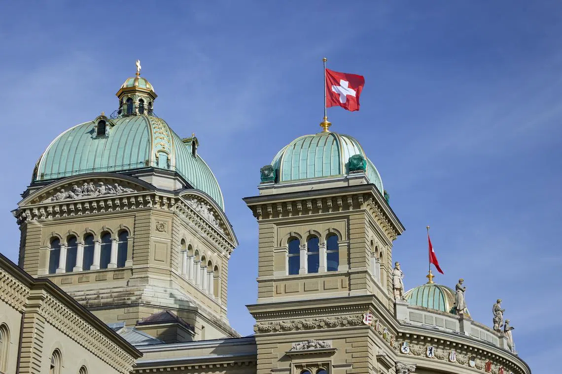 The Swiss Parliament Building (Bundeshaus) is pictured in Bern, Switzerland October 11, 2021. REUTERS/Denis Balibouse/File Photo