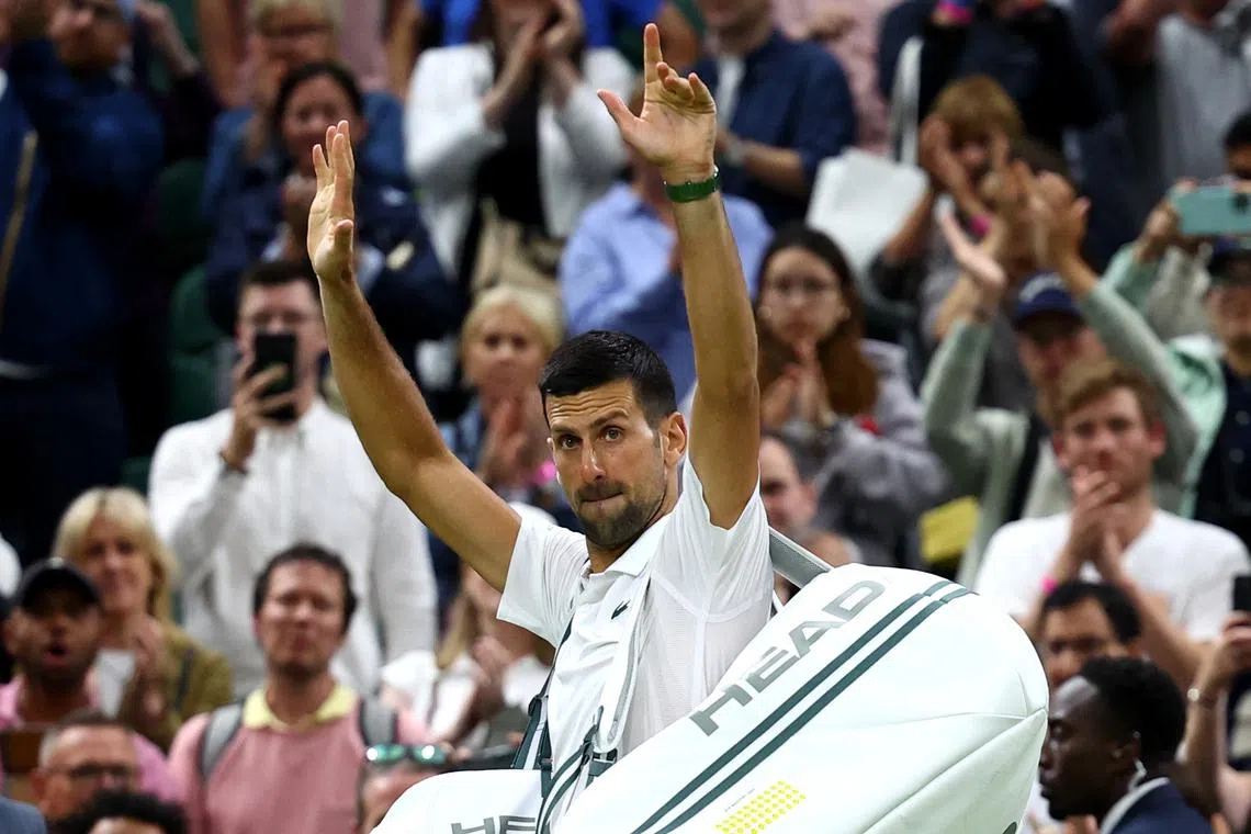 Tennis - Wimbledon - All England Lawn Tennis and Croquet Club, London, Britain - July 8, 2024 Serbia's Novak Djokovic waves to the crowd as he walks off the court after winning his fourth round match against Denmark's Holger Rune REUTERS/Paul Childs