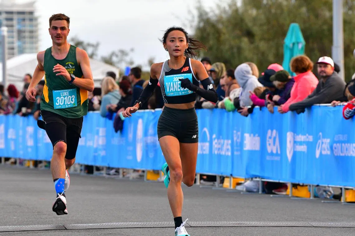 Vanessa Lee (right) set a 10km (road) national record after clocking 35min 55sec at the Gold Coast Marathon.