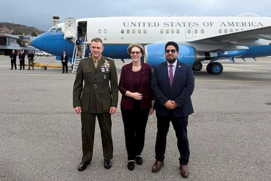 From left: Commander of the US Southern Command Francis L. Donovan, US envoy to Venezuela Laura Farnsworth Dogu, and senior Pentagon official Joseph M. Humire posing for a photo in Caracas on Feb 18, 2026. 