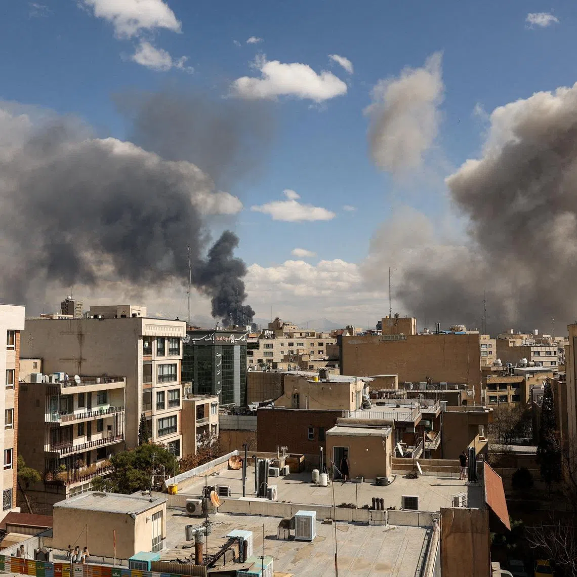 Smoke rises following an explosion in Tehran, Iran, March 1.  Majid Asgaripour/WANA