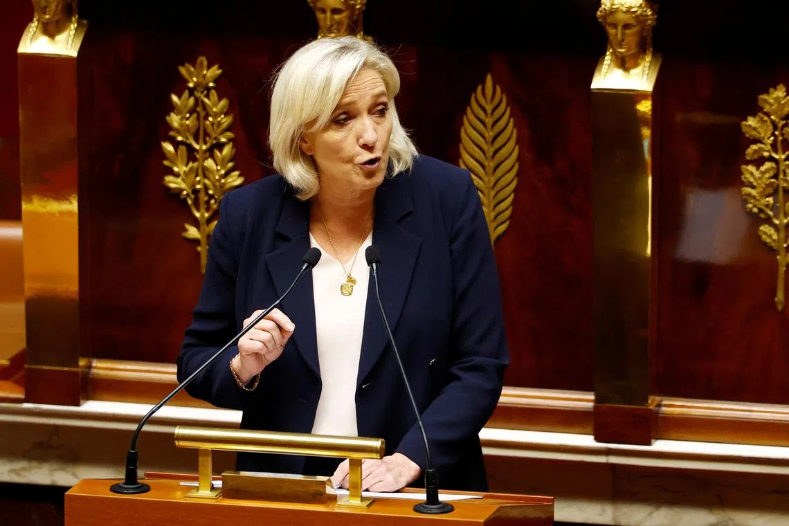 FILE PHOTO: French far-right leader and member of parliament Marine Le Pen, President of the French far-right National Rally (Rassemblement National - RN) party parliamentary group, delivers a speech during a debate session on the first part of the 2025 budget bill (PLF) at the National Assembly in Paris, France, October 22, 2024. REUTERS/Stephanie Lecocq/File Photo