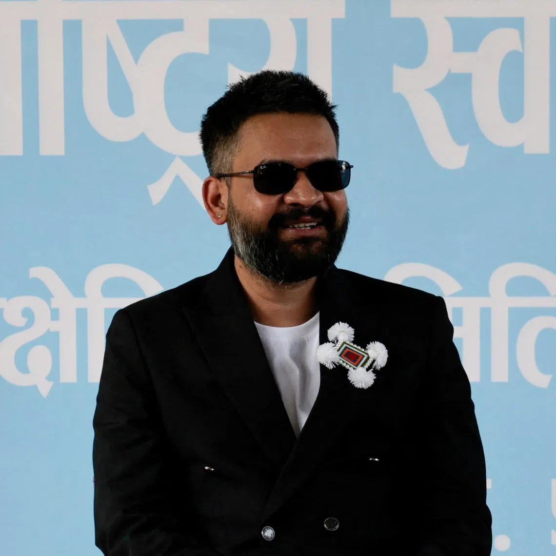 Balendra Shah, a rapper-turned-politician and the prime ministerial candidate for Rastriya Swatantra Party (RSP), smiles as he speaks with people at RSP office ahead of Nepal's general election, in Damak, Jhapa district, Nepal, February 25, 2026. REUTERS/Navesh Chitrakar