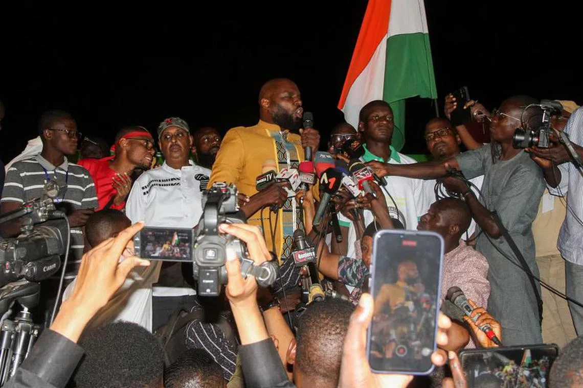 Kemi Seba, a Franco-Beninese  firebrand pro-Russia activist speaks to supporters of the junta that seized power in Niger in July, during a rally near the French military base, calling for the withdrawal of French forces in  Niamey, Niger September 28,2023. REUTERS/Mahamadou Hamidou/File Photo
