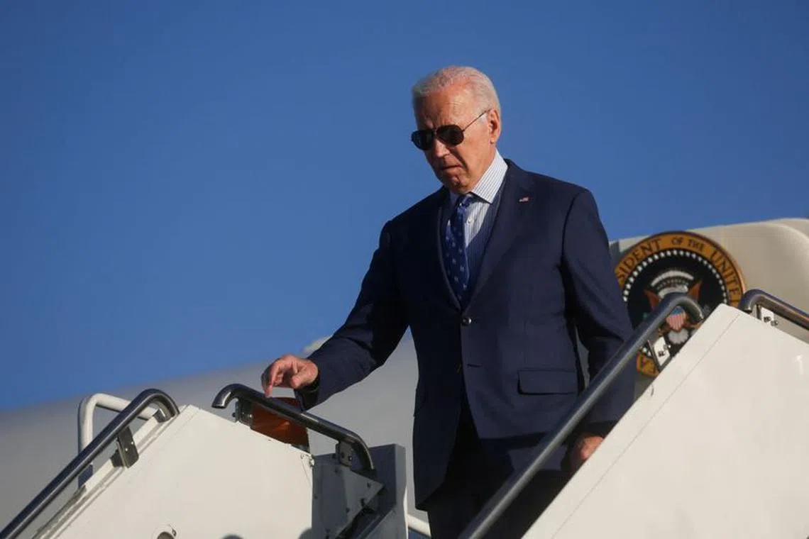 FILE PHOTO: U.S. President Joe Biden disembarks from Air Force One at O'Hare International Airport in Chicago, Illinois, U.S., November 9, 2023. REUTERS/Leah Millis/File Photo