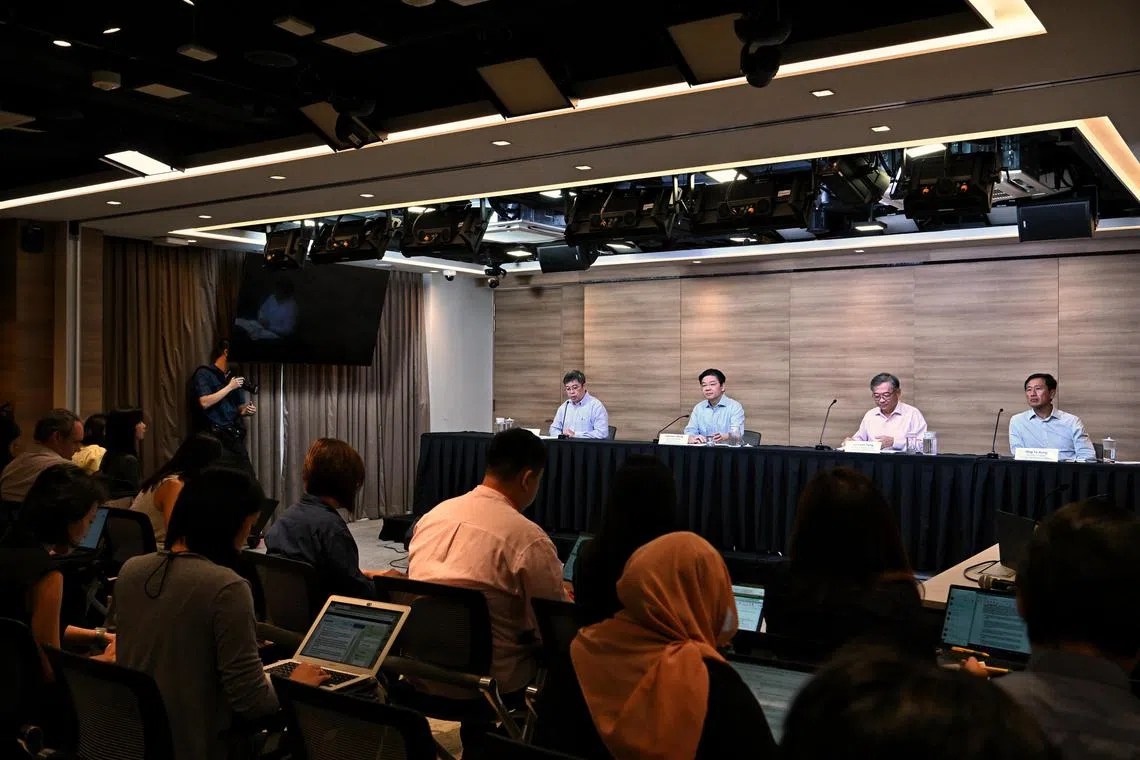 (From left) Director of Medical Services Professor Kenneth Mak, DPM Lawrence Wong, Minister Gan Kim Yong and Minister Ong Ye Kung during the press conference at MCI’s National Press Centre on Feb 9, 2023.