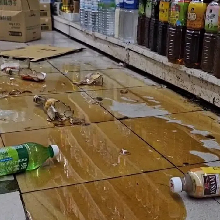 Shattered bottles lining the floors of a supermarket in Taiwan's north-eastern city of Yilan following a 7-magnitude earthquake on Dec 27.
