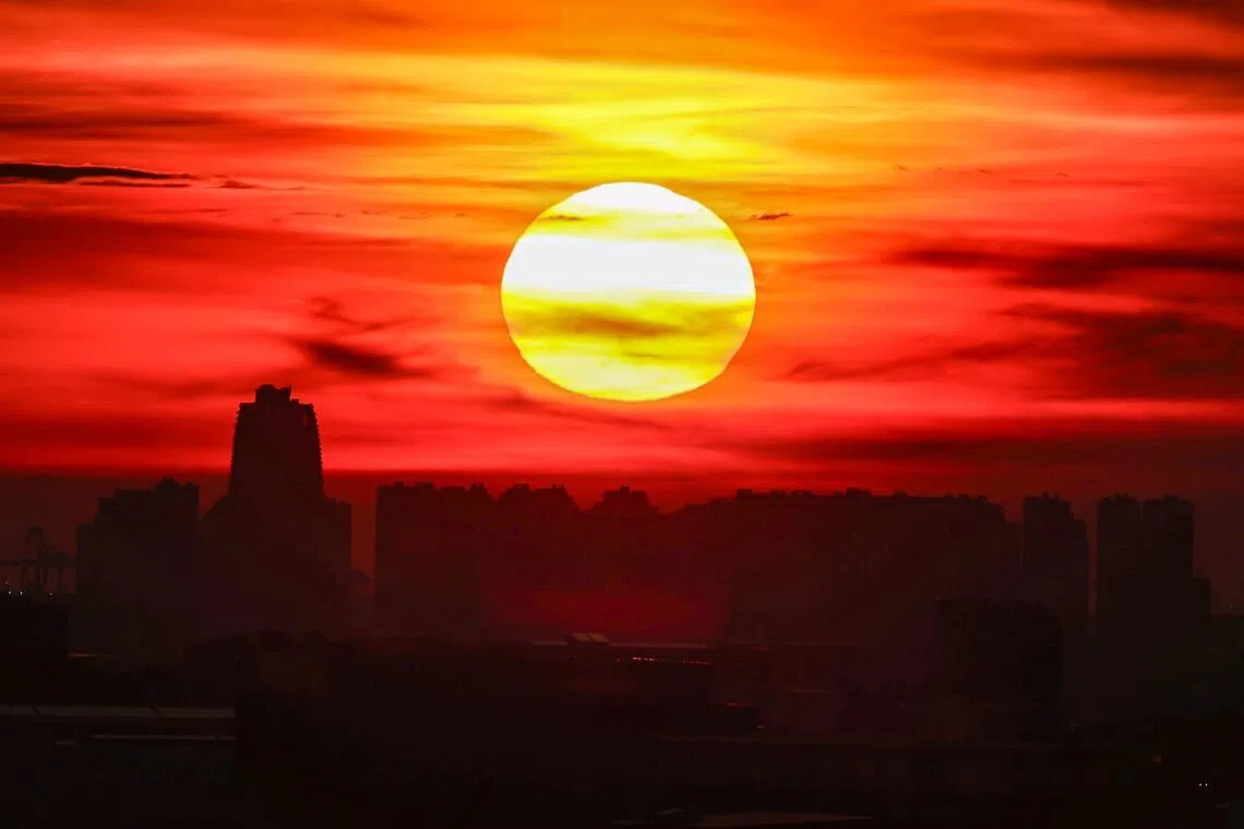 Sunset seen in Tuas, on April 6, 2026. There could be a few sizzling days in Singapore over the next fortnight, with temperatures in some parts of the country forecast to top 35 deg C.
