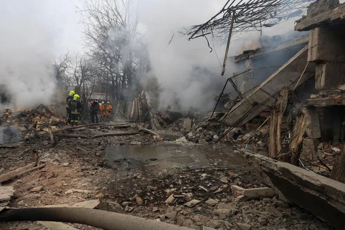 Rescuers work at a site of a residential area hit by a Russian missile strike, amid Russia's attack on Ukraine, in Odesa, Ukraine March 15, 2024. REUTERS/Stringer