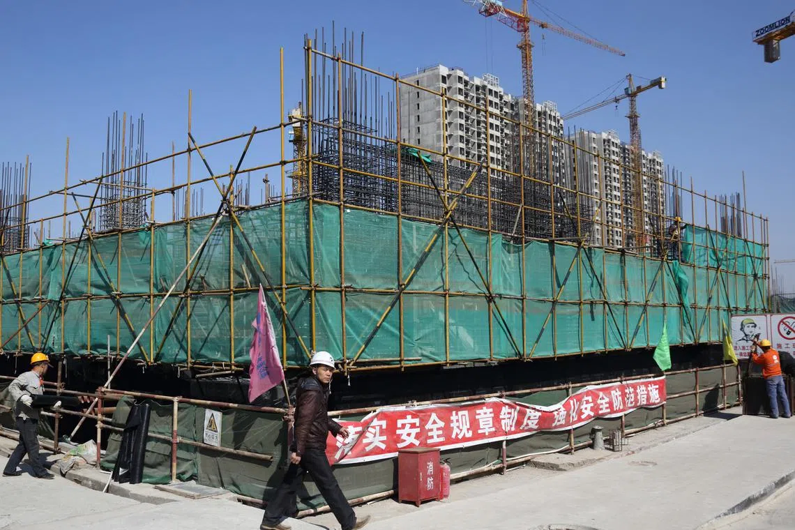 China scrapped the nationwide minimum mortgage interest rate, while cutting the minimum down-payment ratio for first time buyers.