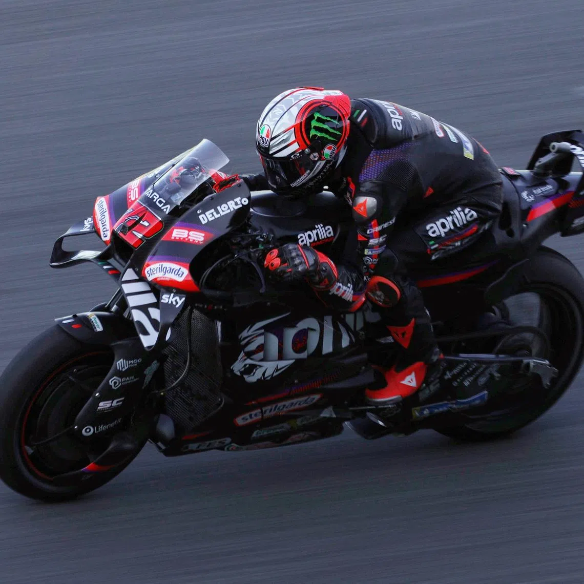 MotoGP - Thailand Grand Prix - Chang International Circuit, Buriram, Thailand - March 1, 2026 Aprilia Racing's Marco Bezzecchi in action during the MotoGP race REUTERS/Athit Perawongmetha