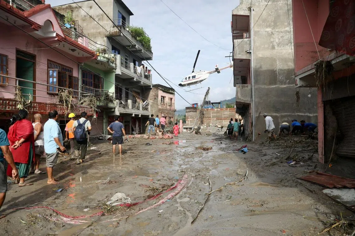 Death toll rises, rescuers search for 1,400 missing after Nepal-Tibet floods