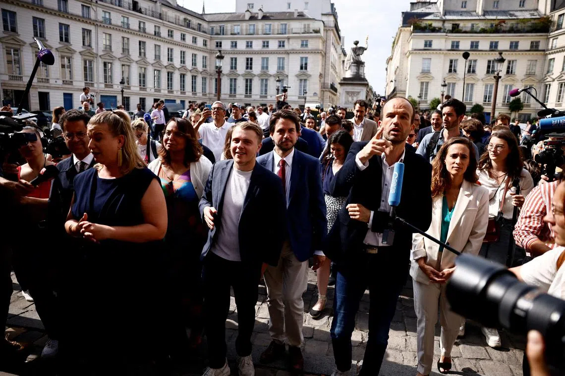 Members of Parliament of the French far-left opposition party La France Insoumise (France Unbowed) and the alliance of left-wing parties, called the New Popular Front -arriving with other elected Members of Parliament at the National Assembly in Paris on July 9, 2024.  