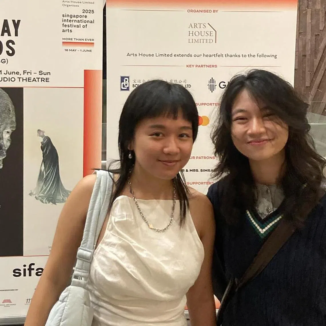 Erika Poh and a friend after watching stray gods at SOTA Studio Theatre.