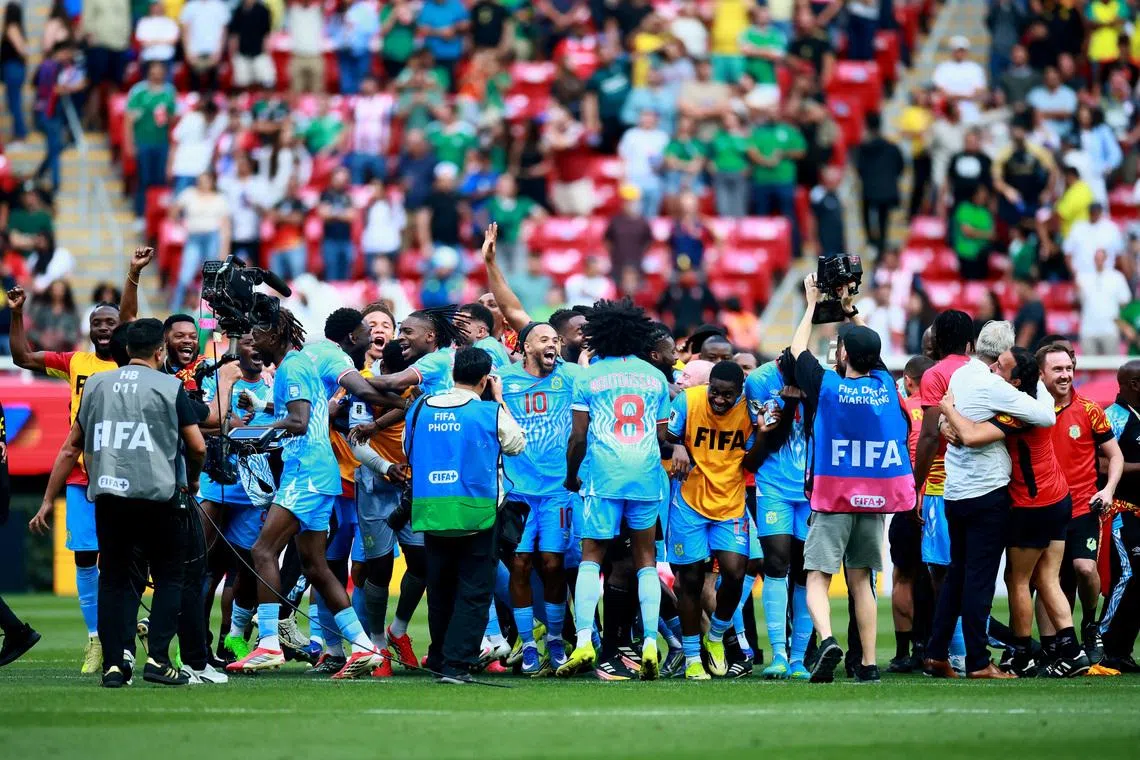 Soccer Football - FIFA World Cup - Inter-Confederation Playoffs - Final - DR Congo v Jamaica - Estadio Guadalajara, Guadalajara, Mexico - March 31, 2026 DR Congo players celebrate qualifying for the FIFA World Cup REUTERS/Eloisa Sanchez