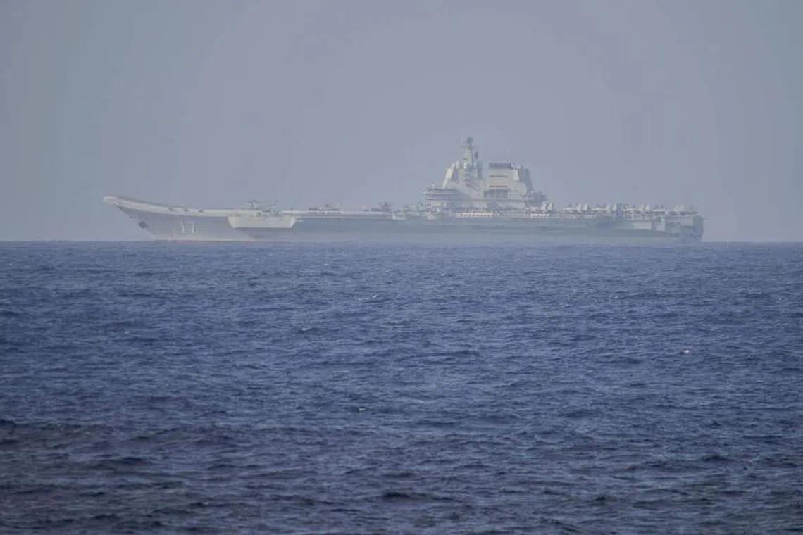 Chinese aircraft carrier Shandong in Pacific Ocean waters, some 300 kms (186 miles) south of Okinawa prefecture, on April 5.